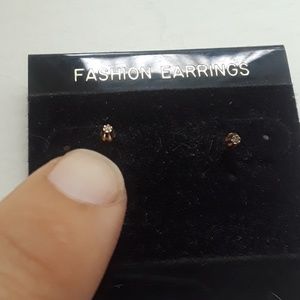 Used girls 14 karat gold and diamond earrings stud